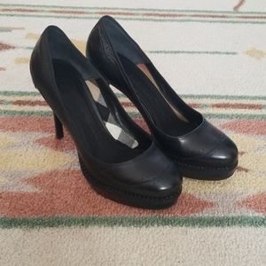 Burberry "Alington" platform heels.